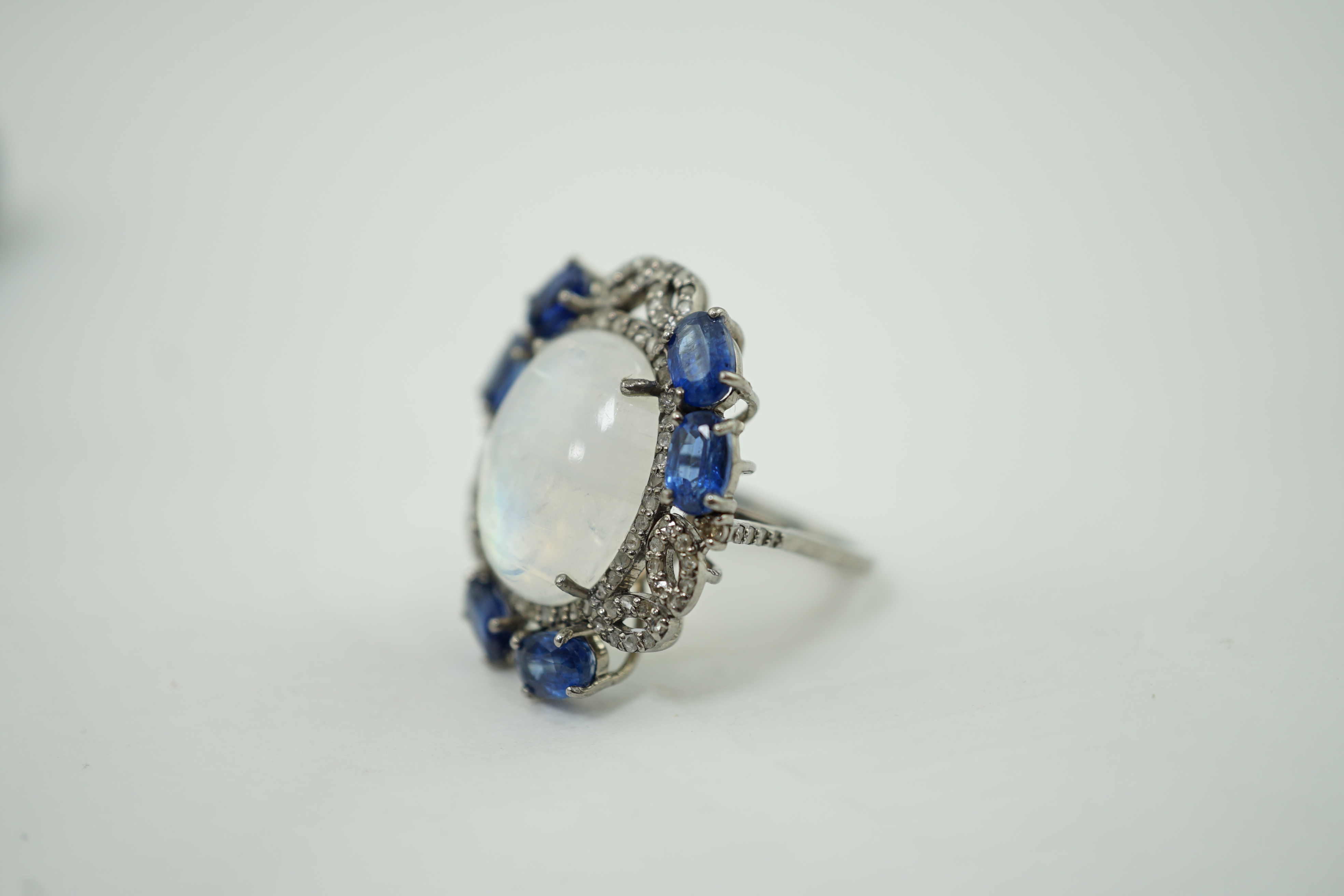 A white gold?, labradorite, sapphire and diamond cluster dress ring